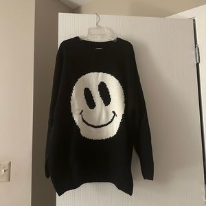 Smiley face sweater by Urban Daizy